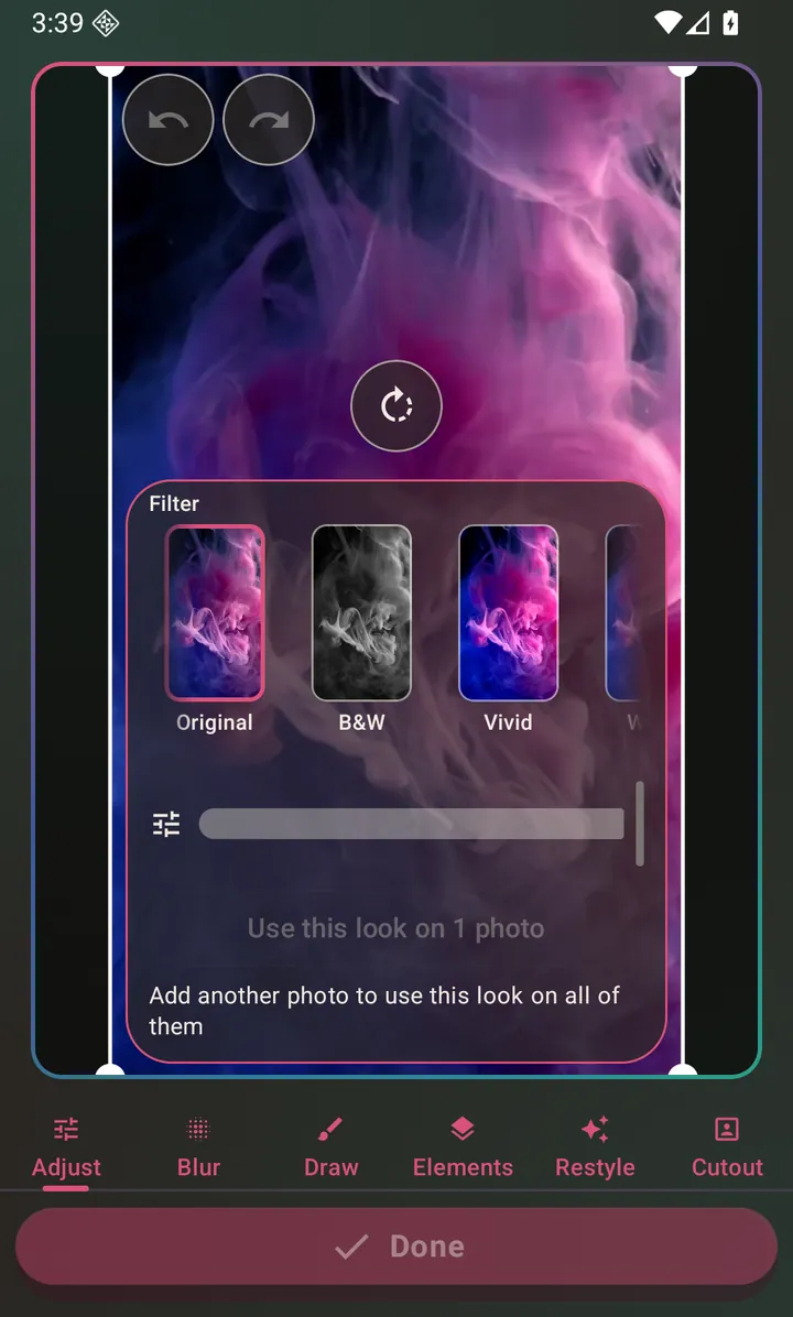Crop handles, rotate, the row of looks and the three adjustment sliders.